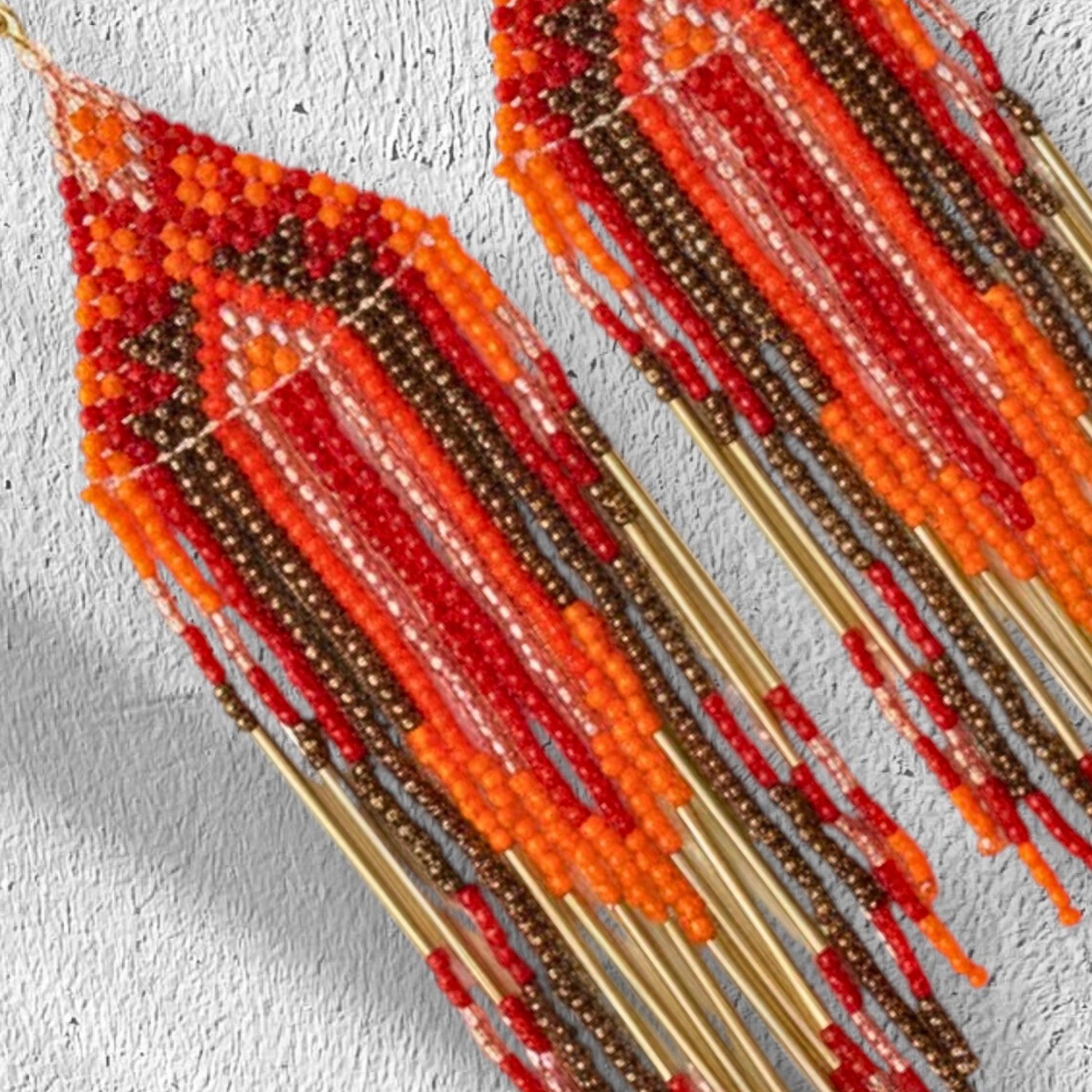 Warm toned statement fringe earrings with metallic gold, bronze, red and rust seed beads - Jewelry gifts for women by Saffron and Selene hand beaded jewelry for women