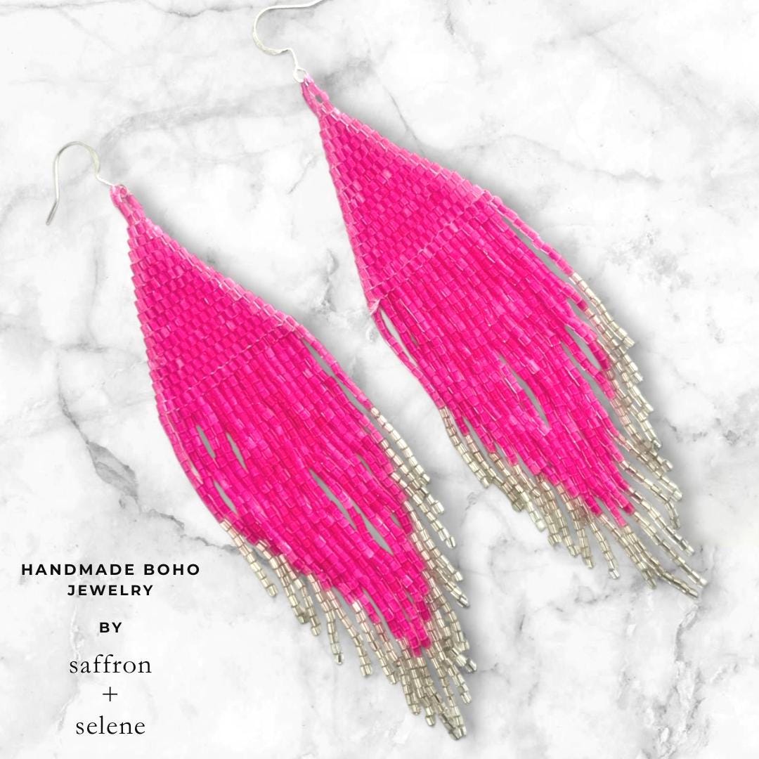 Boho statement earrings in bright pink with long fringe design