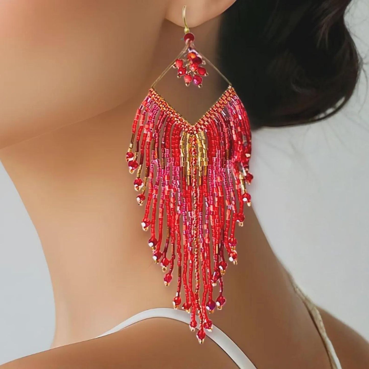 Boho beaded fringe earrings in mixed seed beads, long drop style worn on model, handmade by Saffron & Selene