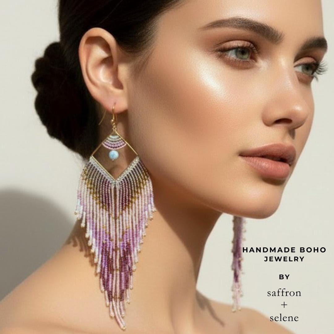 Handmade pink seed bead earrings photographed on model for scale