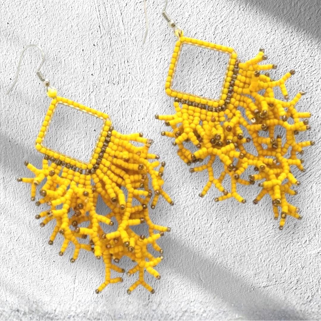 Handmade yellow resort earrings.  Beaded dangle earrings for summer holiday styling by Saffron and Selene