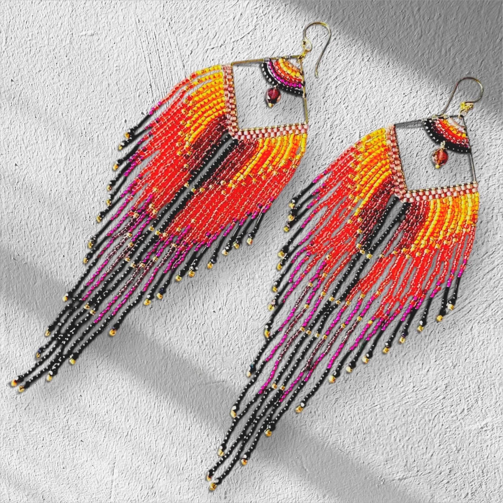Handmade boho statement earrings with orange pink yellow black and gold seed bead fringe
