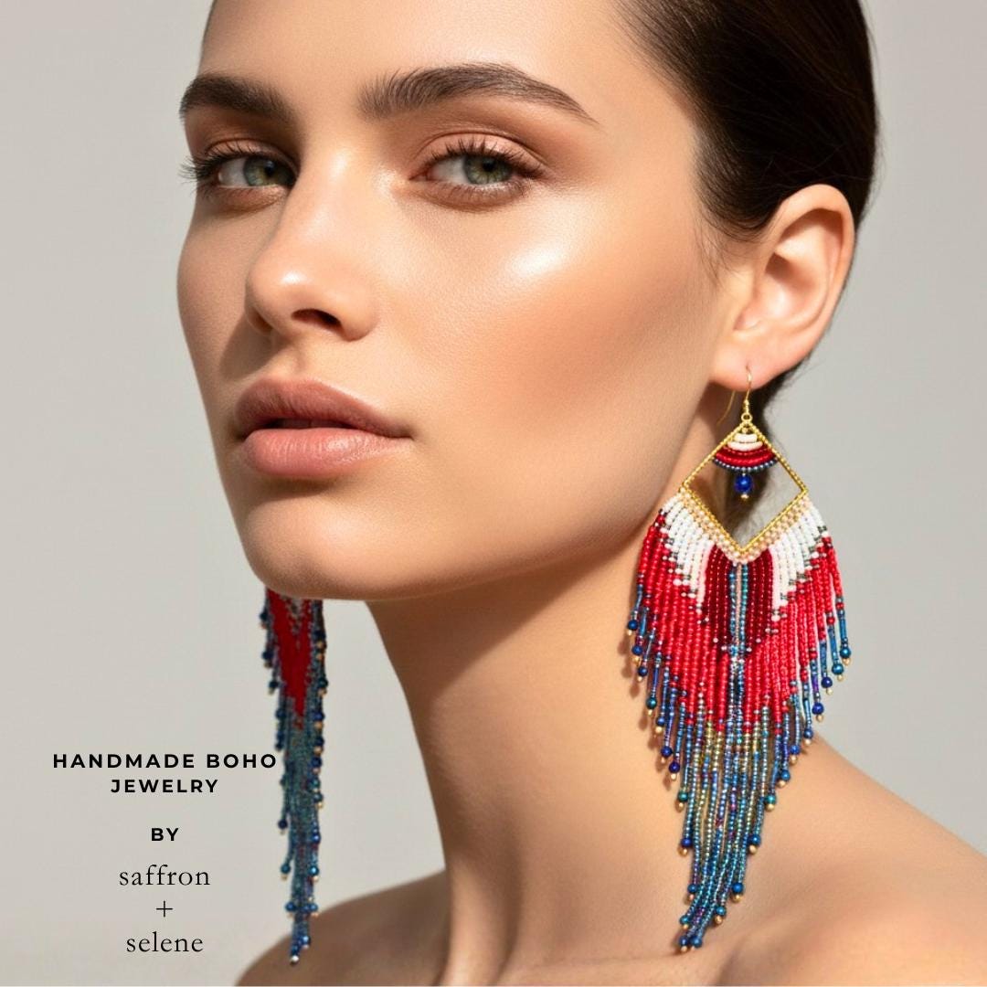 Cowgirl style earrings featuring artisan beadwork and long fringe