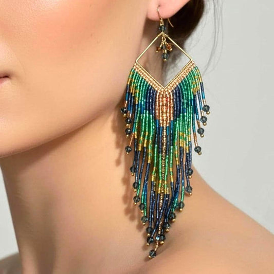 Handmade peacock fringe earrings with blue and green beadwork