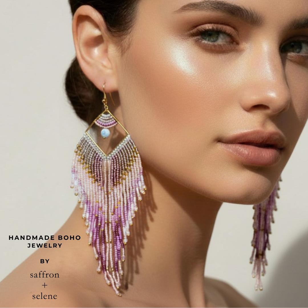 Pink seed bead dangle earrings showing detailed handcrafted beadwork