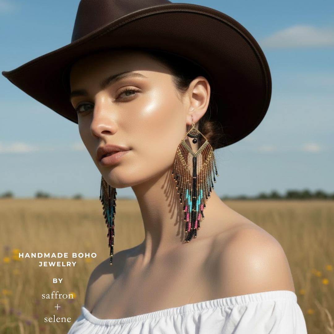 Cowgirl Glam Feather fringe beaded earrings in bronze, black and turquoise with cerise pink and metalic gold highlights.  Handmade by Saffron and Selene Boho Jewelry for women perfect for festival and western style