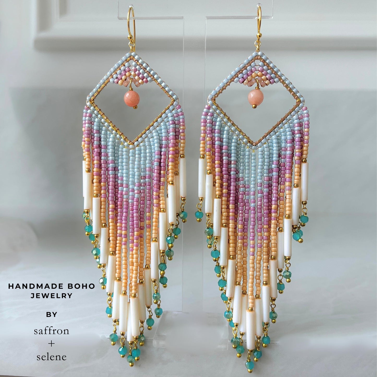 Long pastel statement earrings with turquoise crystal fringe