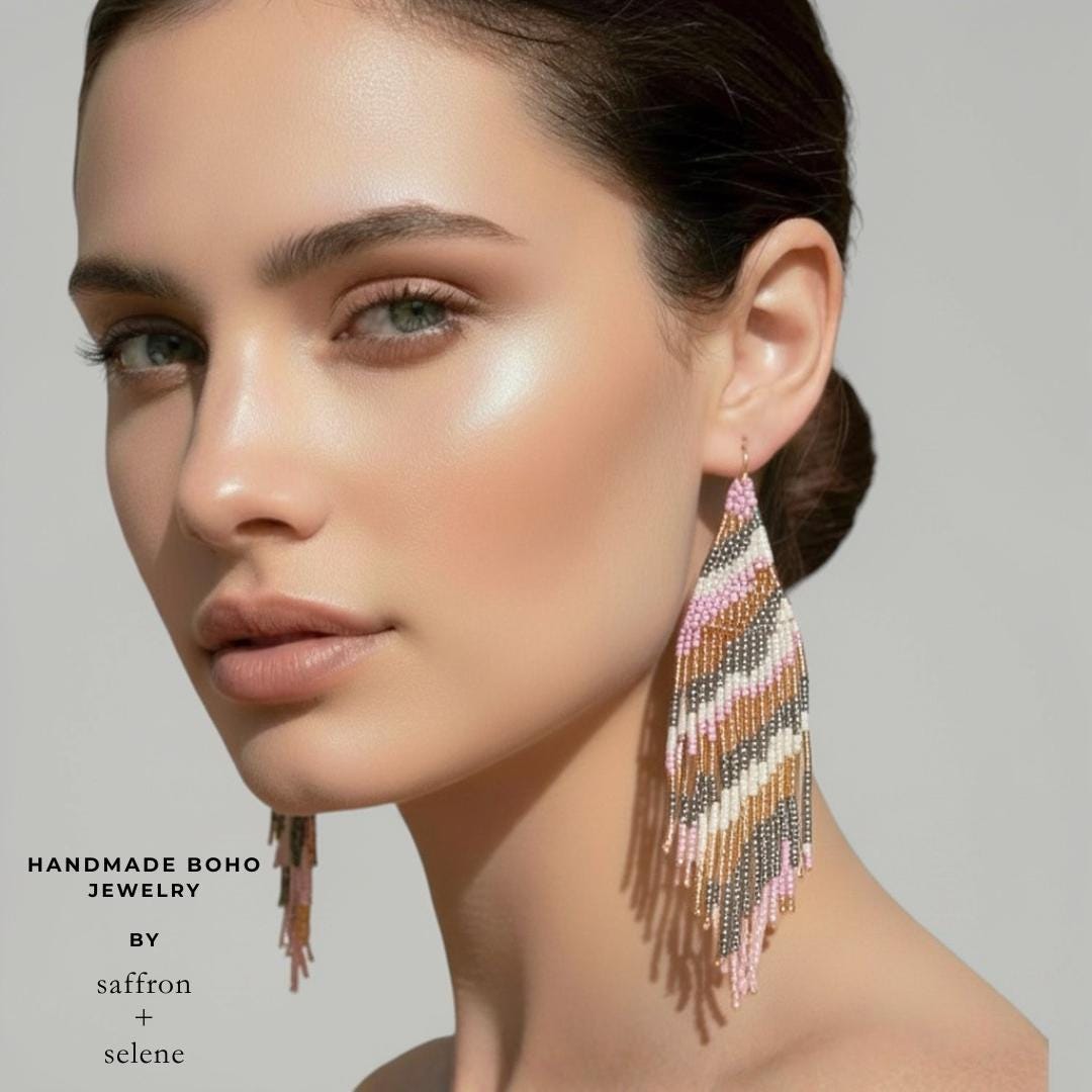 Long seed bead statement earrings in soft lilac champagne cream and silver with geometric boho design.
