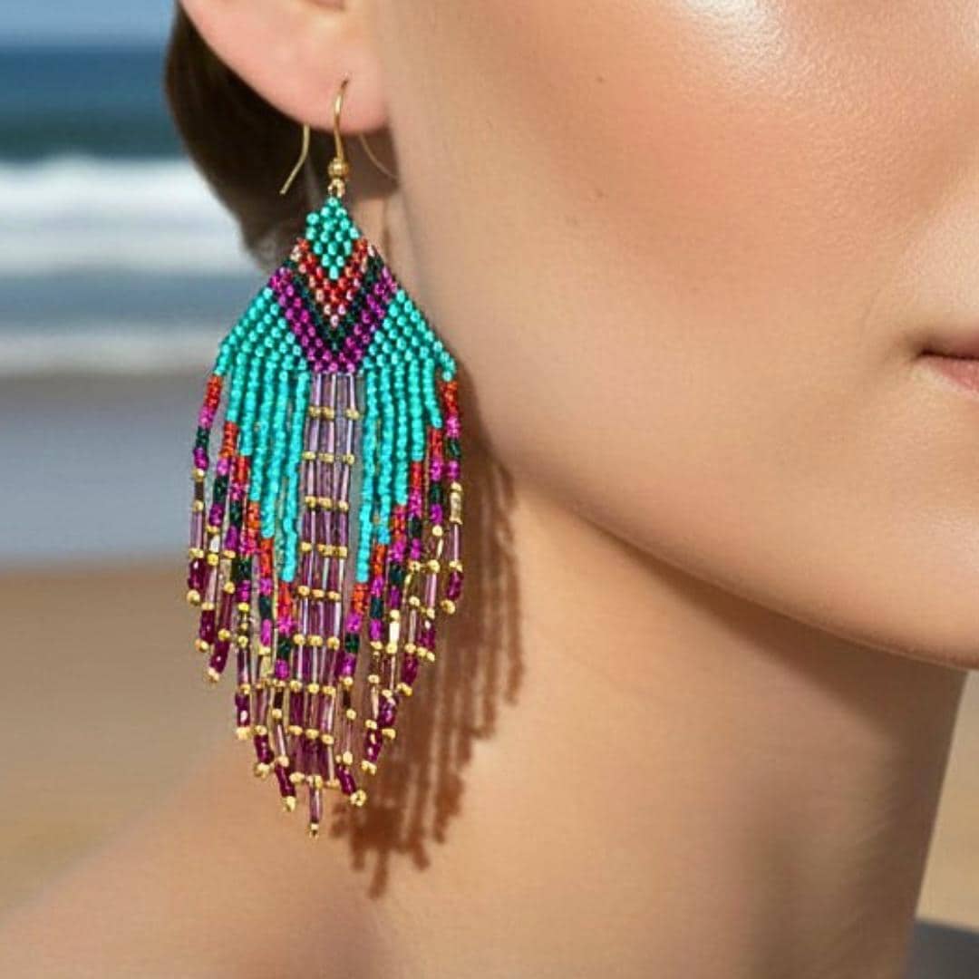 Handmade fringe earrings in turquoise, gold and pink by Saffron and Selene