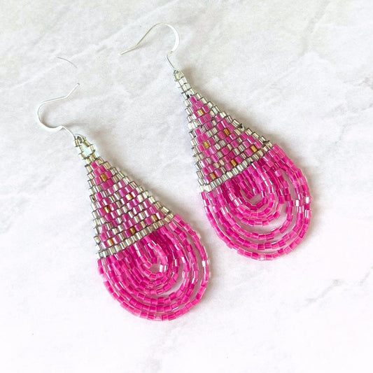 Handmade bright pink beaded teardrop statement earrings with iridescent silver metallic beads.