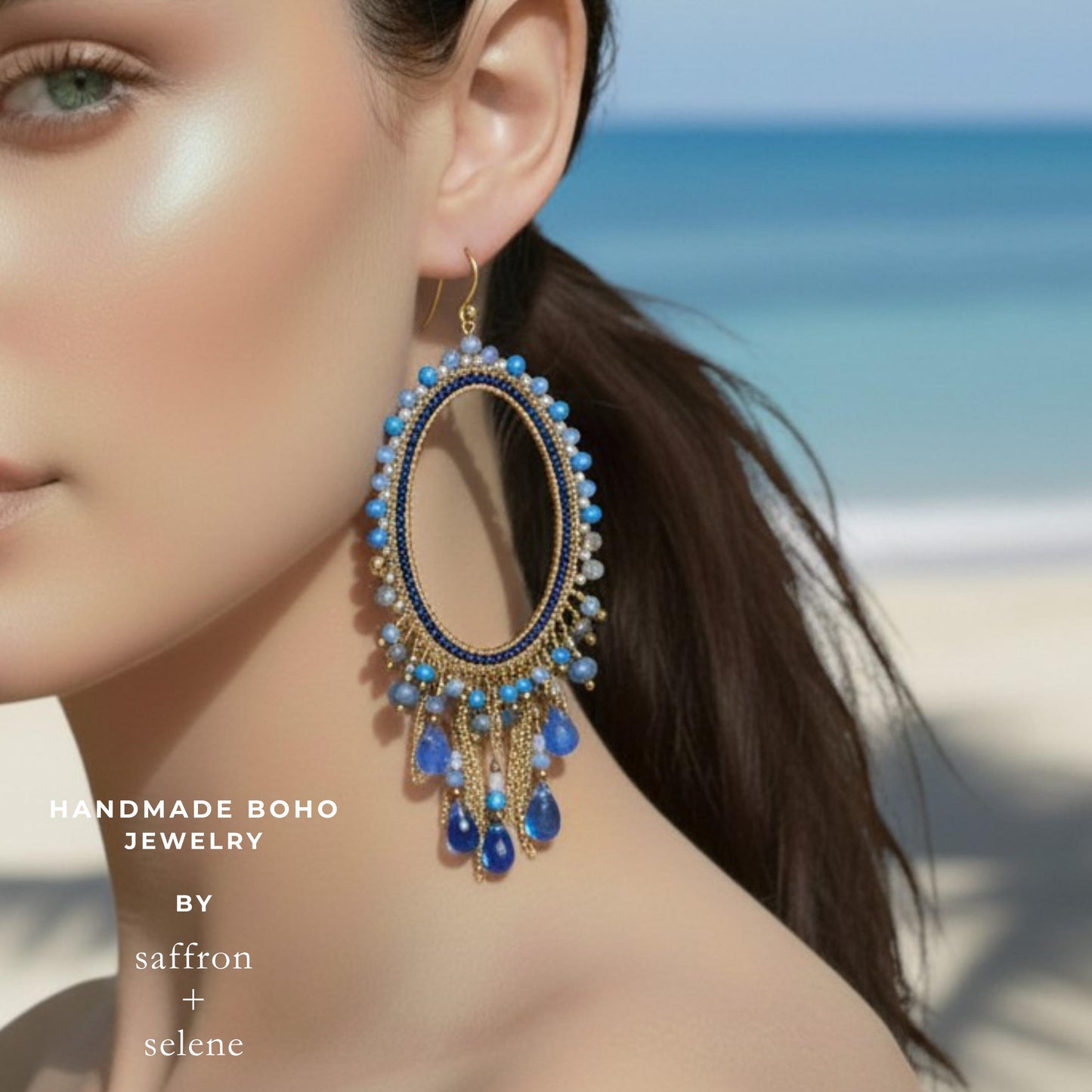 Luxury artisan blue beaded earrings with gold chain fringe and crystal accents