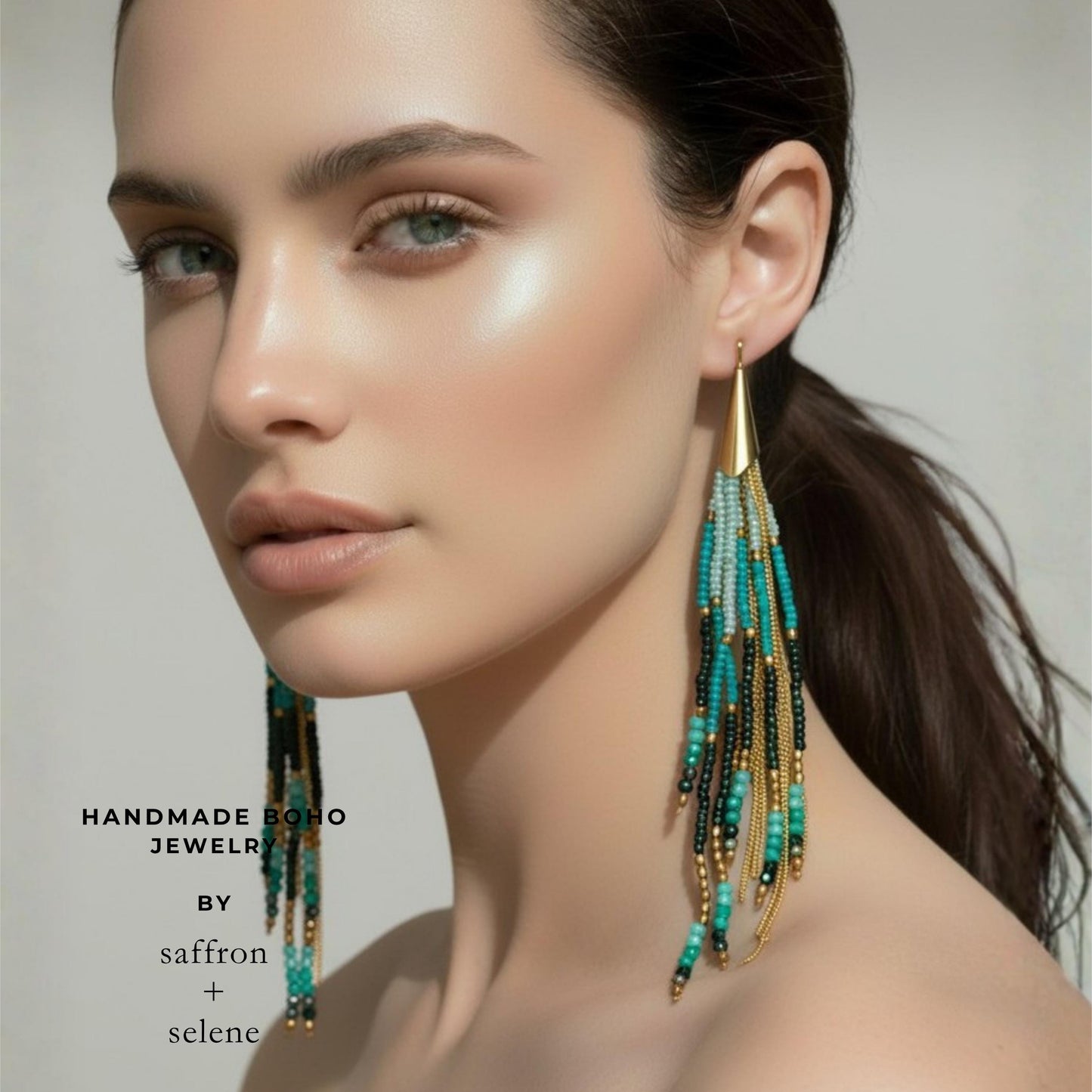 Long beaded fringe earrings in turquoise, peacock green and jade with delicate gold chain accents and artisan craftsmanship.