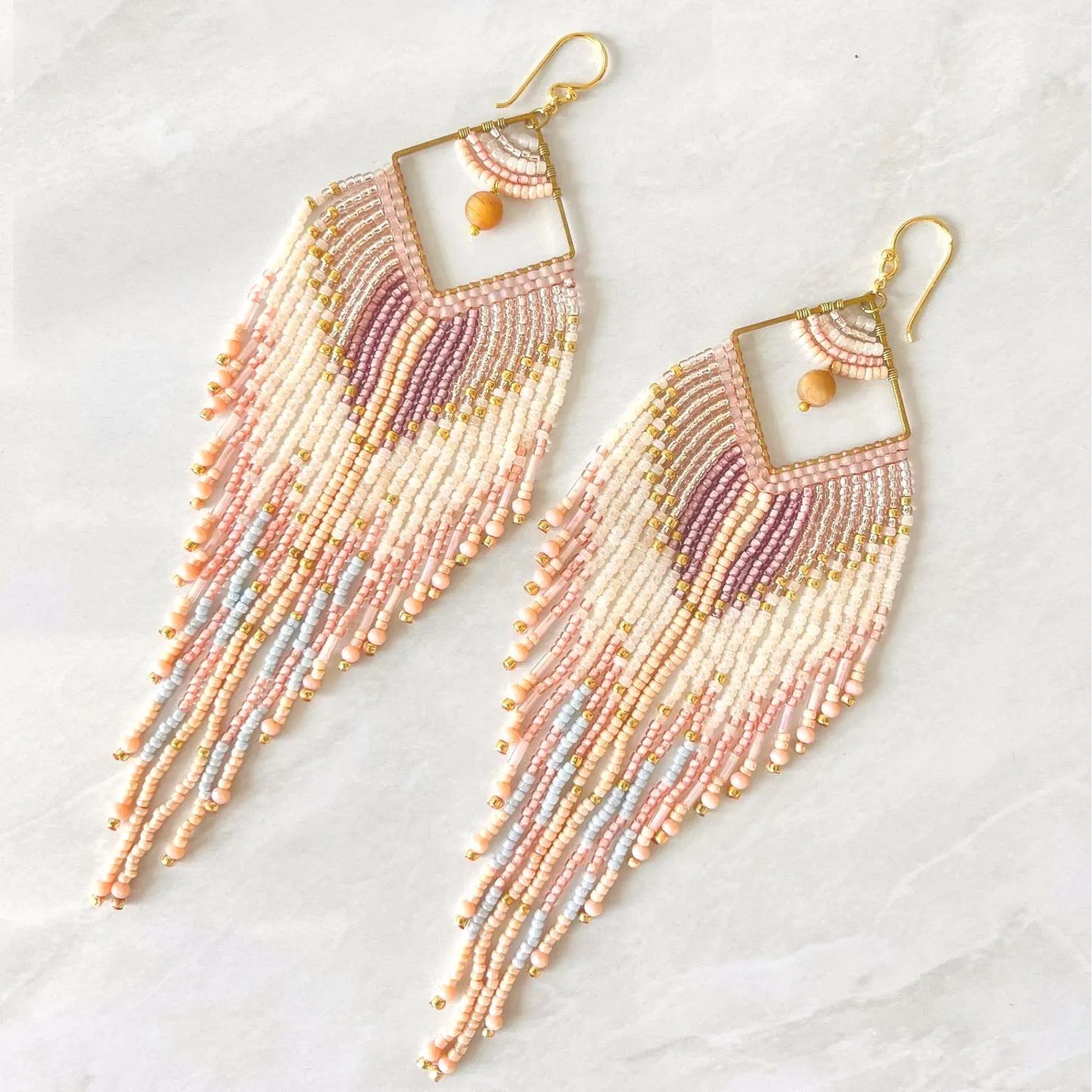 pastel hand beaded feather style seed bead earrings by Saffron and Selene