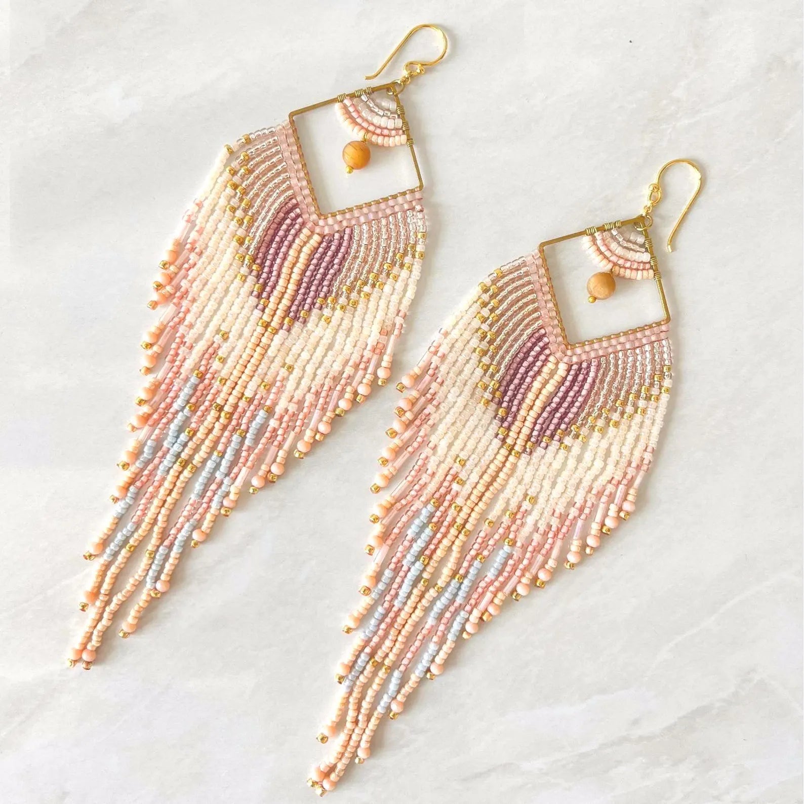 pastel hand beaded feather style seed bead earrings by Saffron and Selene
